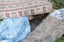 El cadáver estaba dentro del colchón y envuelto en sábanas.