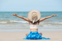 happy-asian-woman-smiling-and-having-fun-at-beach