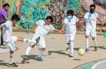 match-day-abbott-and-real-madrid-foundation-kids-playing-football