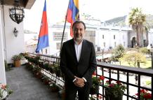 Rafael Correa y pabel Muñoz