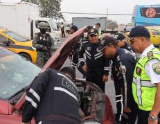 Vigilantes de la CTE se unen a controles policiales de vehículos.