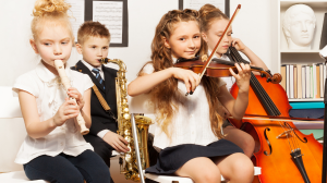 Hallan evidencias de beneficios cognitivos en niños por tocar un instrumento
