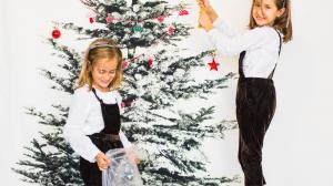 two-girls-decorating-christmas-tree