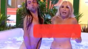 Captura de video en el que se muestra el semidesnudo de Laura Bozzo.