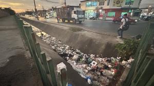 Basura acumulada en Mucho Lote 1