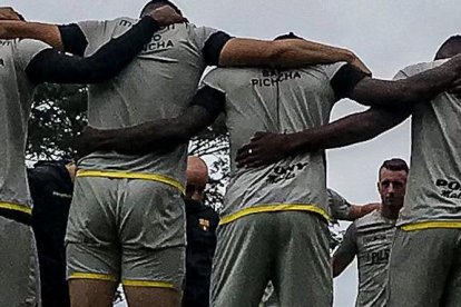 Barcelona y una oración antes del entrenamiento.