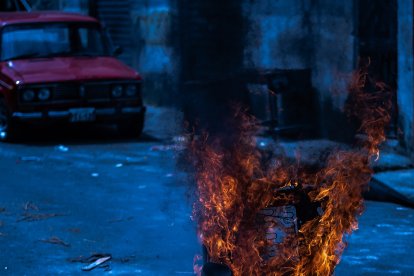 Las 21 imágenes del fotógrafo Vicho Gaibor son de tonalidad azul, color que asoció con el ambiente frío de la morgue.