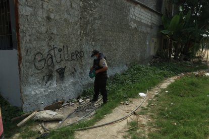 La palabra “gatillero” está escrita sobre una pared de la cooperativa 28 de Agosto. En este sector se 
han registrado varias muertes violentas.