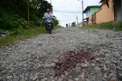 Los habitantes del barrio en el que mataron a cuatro personas temen dar detalles de lo ocurrido.