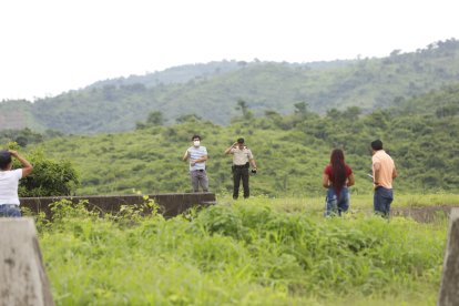 El cuerpo de Cristian Realpe fue hallado al fondo del "canal de la muerte". Este habría sido disparado tres veces.