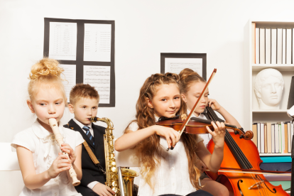 Hallan evidencias de beneficios cognitivos en niños por tocar un instrumento