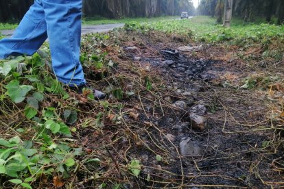 En un carretero del recinto Faita, de Quevedo, encontraron al abogado sin cabeza y a su primo quemados.