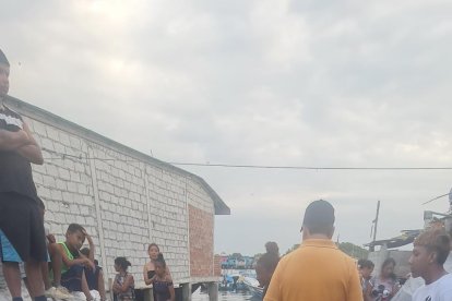 El tercer cadáver fue llevado al muelle del barrio 5 de Diciembre en Puerto Bolívar.