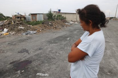 En esta calle de tercer  orden, en el cantón Durán, fue  hallado el cuerpo de la mujer.