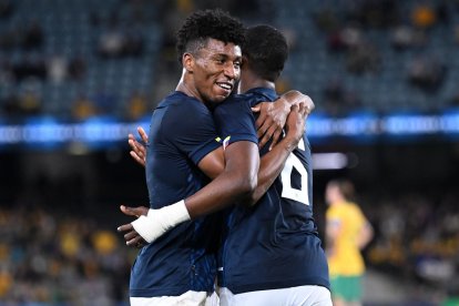 William Pacho y Kevin Rodriguez en celebración.