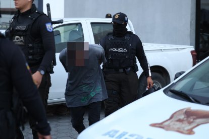 Uno de los sospechosos capturados por la Policía.