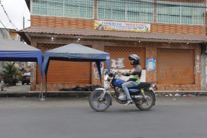 El ataque ocurrió en este taller mecánico de Durán.