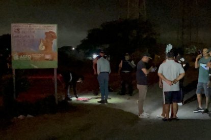 Los dos jóvenes fueron ejecutados en la vía oscura que conduce al basurero.