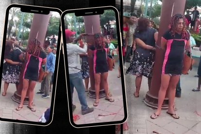 Estas dos personas fueron amarradas a un poste.