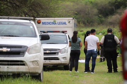 Los cuerpos fueron embarcado en el Carro de Medicina Legal.