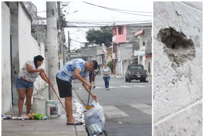 Moradores limpiaron el sitio este viernes. Una pared de la escuela quedó con orificios a causa de los impactos de balas.