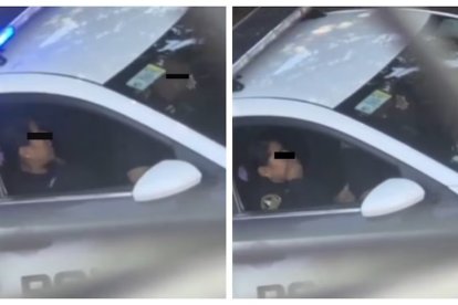 Los policías fueron captados realizando actos sexuales dentro de una patrulla.