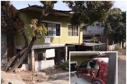 En este inmueble se produjo el triple asesinato. Un carro que estaba dentro quedó con orificios de balas.