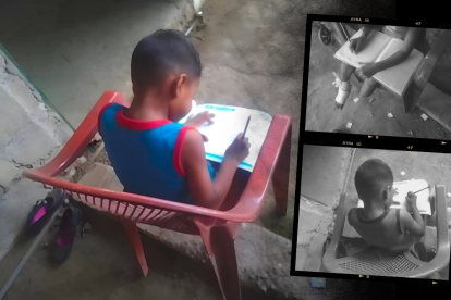 Con ayuda de su familia, el niño procura cumplir con las tareas de la escuela.