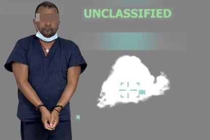 Andrés Fernando Tufiño mientras fue detenido por la Policía Nacional.