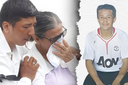 Rita Lucas recibe el consuelo de su otro hijo tras la muerte de Juan Gregorio Garcés Lucas.