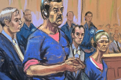 Nicolás Maduro (c), junto a su esposa,, Cilia Flores (d), compareciendo ante un tribunal federal en Nueva York (EE.UU.)