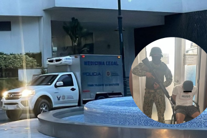 Personal de Criminalística realiza el levantamiento del cuerpo en el sector de Puerto Santa Ana, en Guayaquil.