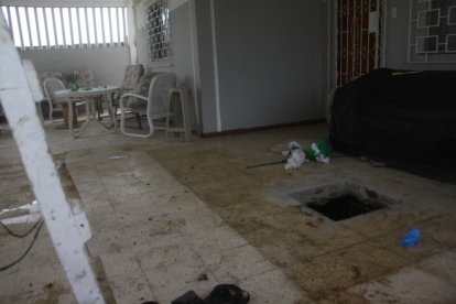 En esta cisterna fue encontrada la extranjera.