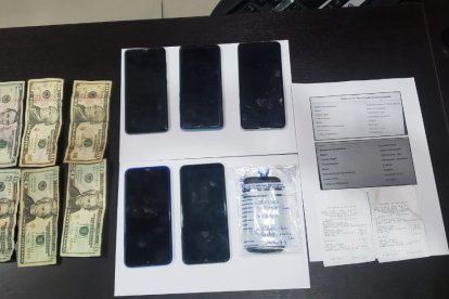 La policía indaga a los detenidos para que les dijera dónde está el resto del dinero.