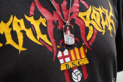 Axel Herrera lleva en un dije la foto de su amada Khateryne Cedeño.