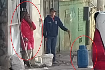 Alias Pastora junto a un cilindro de gas, el cual amenazaba con hacer explotar