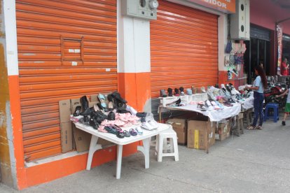 La farmacia cerca de donde asesinaron a un vendedor de batidos, en Pascuales, permanece cerrada.