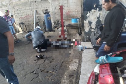 Se reportó un asesinato dentro de una taller mecánico, en Santa Elena.