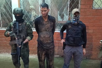 Uno de los sospechosos que tenían cautivos a más de cuarenta trabajadores.