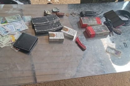 Armas y municiones entre las evidencias.