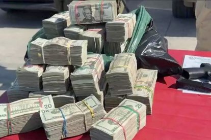 Parte del dinero incautado en el allanamiento realizado por los investigadores.