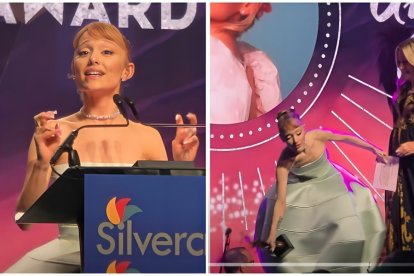 Momento en que le cae el premio a Ariana Grande.