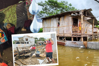 Las familias procuran recuperar sus pertenencias en sus casas inundadas.