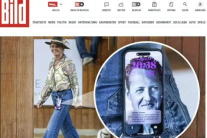 Instante en que la esposa de Schumacher deja ver el protector de pantalla de su celular con la foto de Michael.