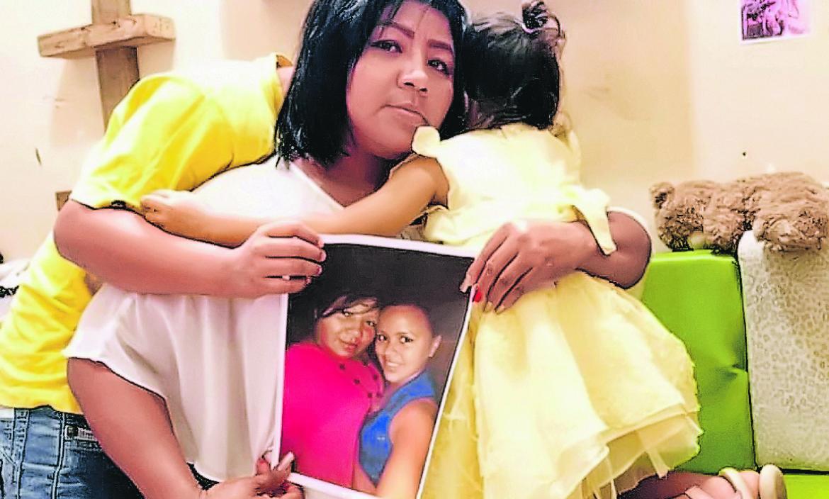 Con una foto de Evelyn Bravo Bodero, su familia mantiene vivo su recuerdo.