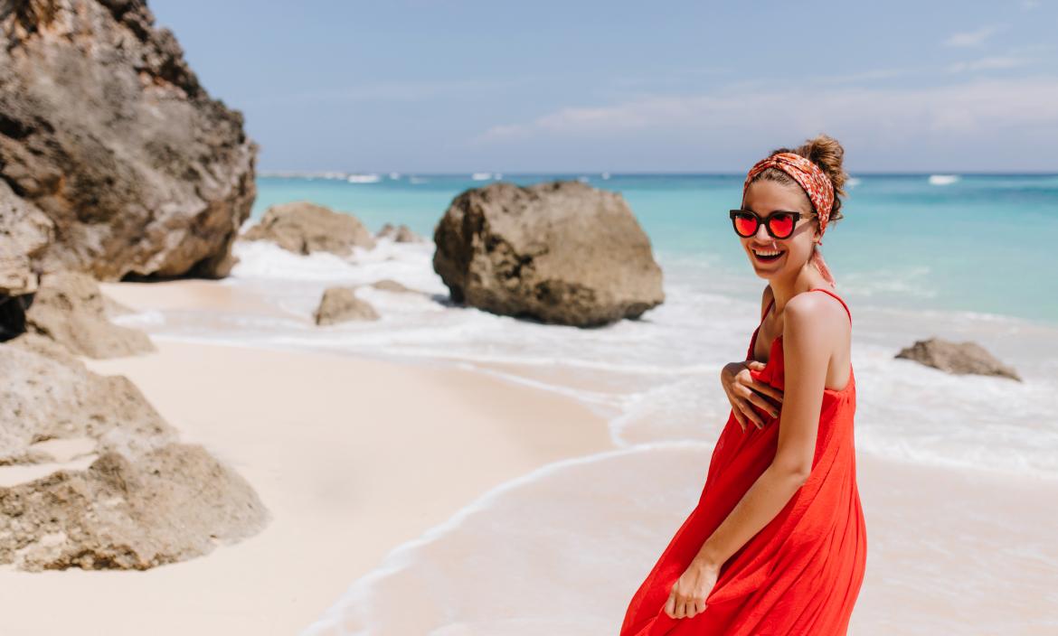 lovely-girl-with-charming-smile-spending-morning-near-ocean-outdoor-photo-of-european-young-lady-in-red-dress-having-fun-at-sea-resort