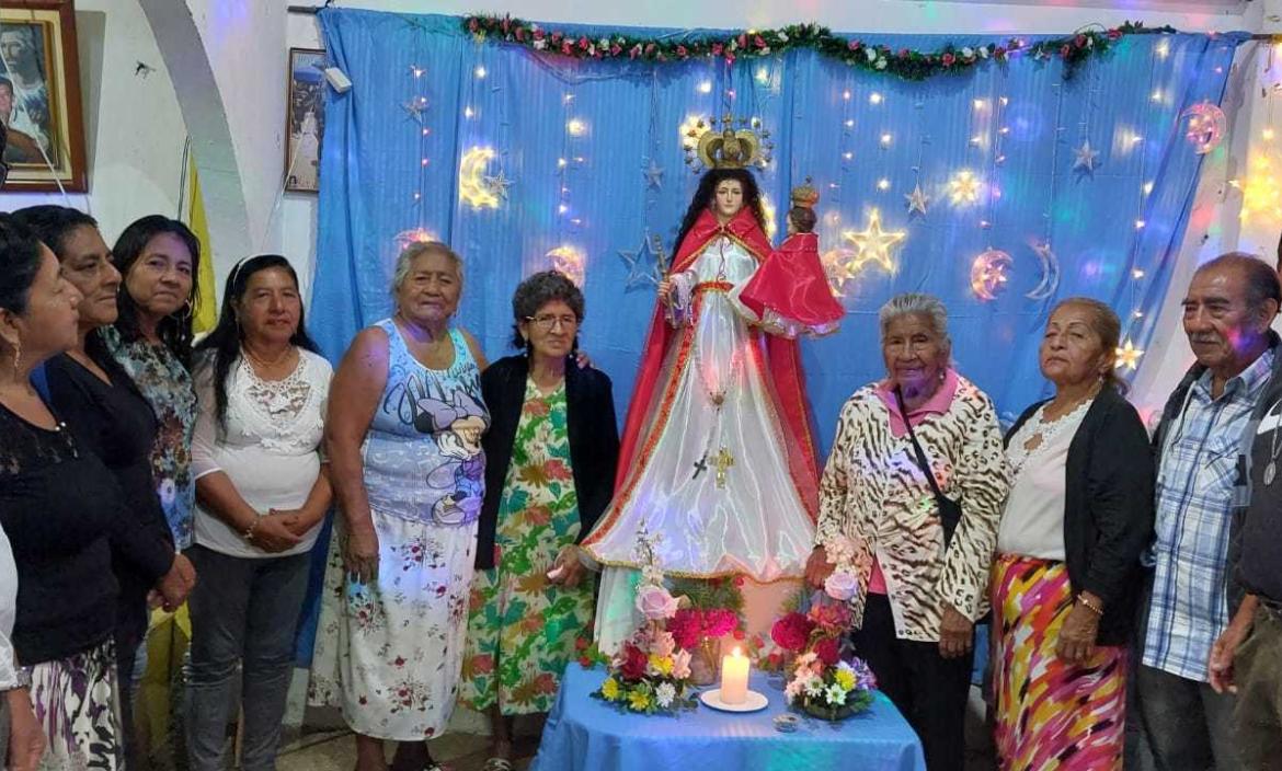 devotos de la virgen en Playas