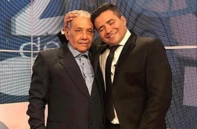 Henry Bustamante con su papá.