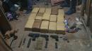 La policía encontró 15 bloques de marihuana  y cuatro armas.