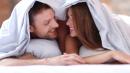 lovely-couple-in-bed-under-the-covers